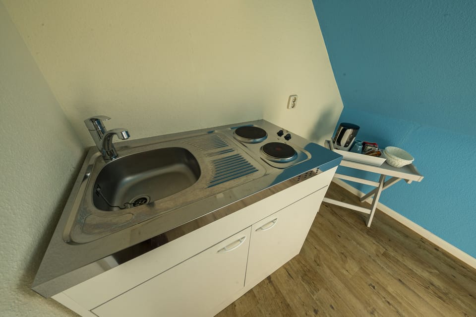 Family Suite, 2 Bedrooms, Balcony | Private kitchenette | Coffee/tea maker, electric kettle
