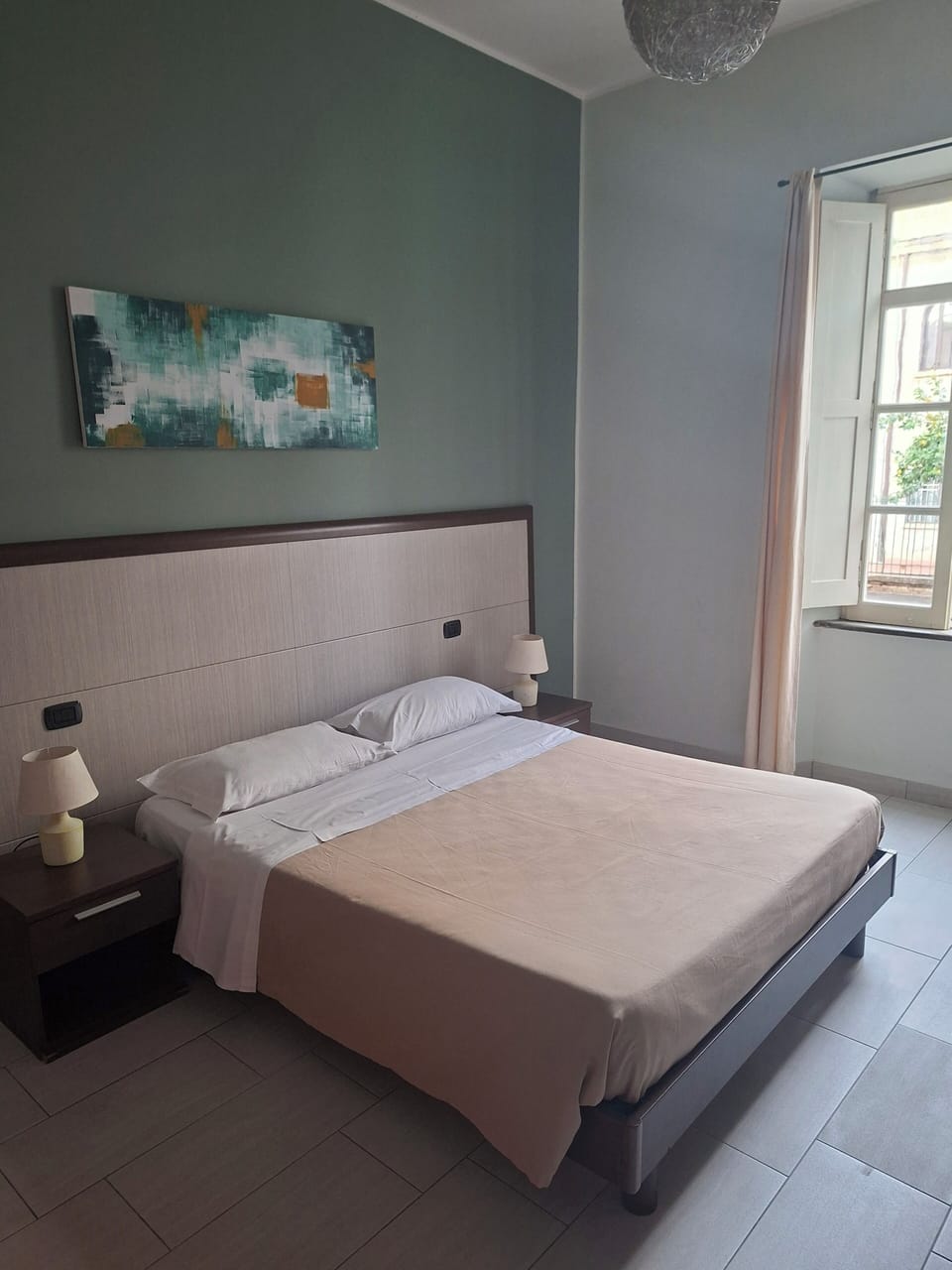 Triple Room | Minibar, in-room safe, desk, iron/ironing board