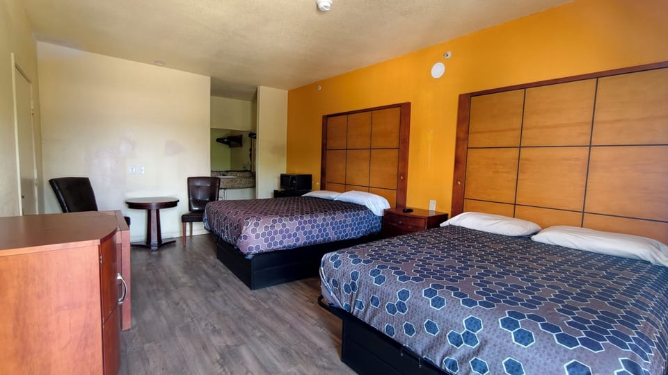Room, 2 Queen Beds, Non Smoking | Free WiFi, bed sheets, alarm clocks