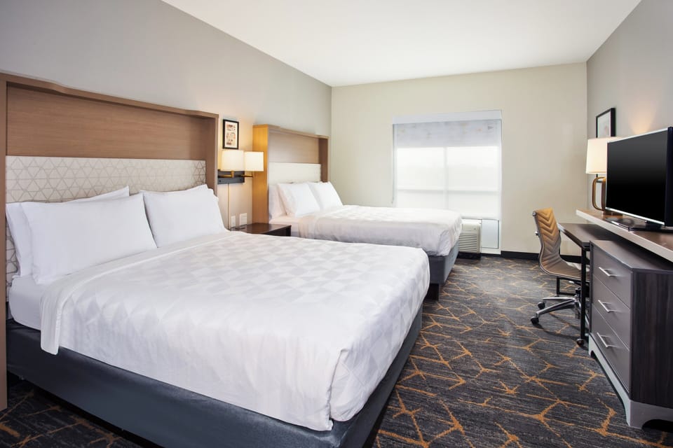 In-room safe, desk, iron/ironing board, cribs (free)