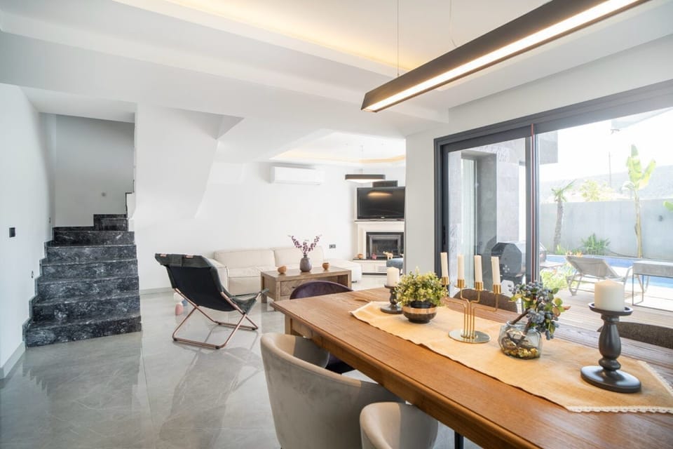 Villa | Living area | 108-inch Smart TV with satellite channels, Netflix, streaming services