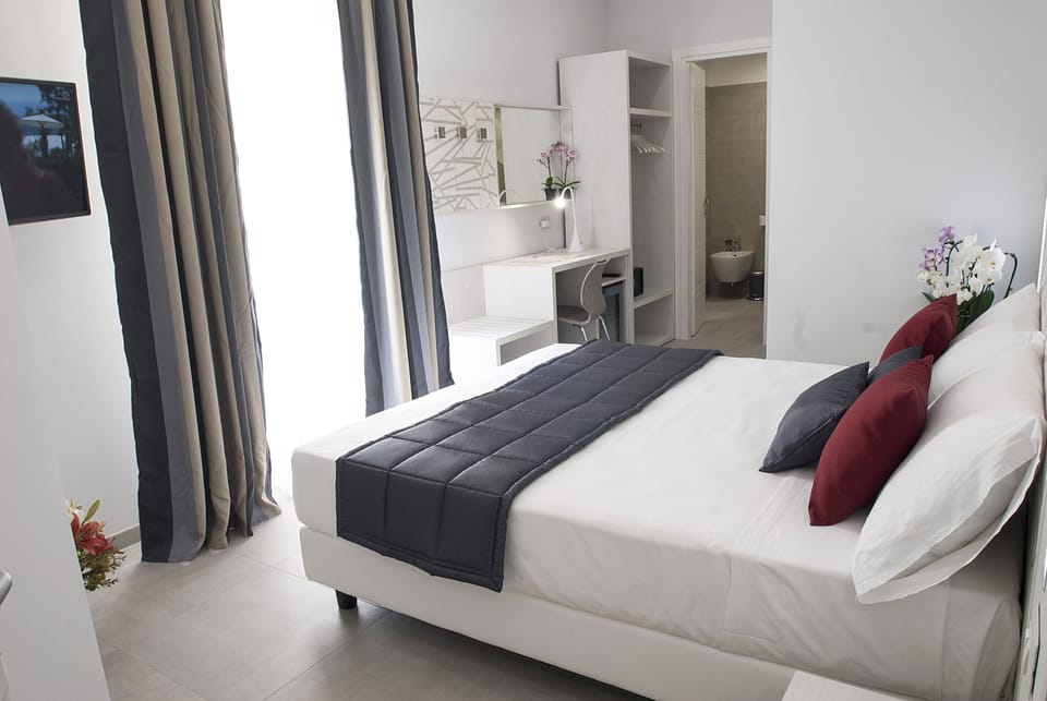 Standard Double or Twin Room | Minibar, in-room safe, desk, soundproofing