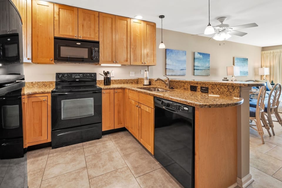 Condo, 2 Bedrooms | Private kitchen | Fridge, oven, coffee/tea maker, toaster
