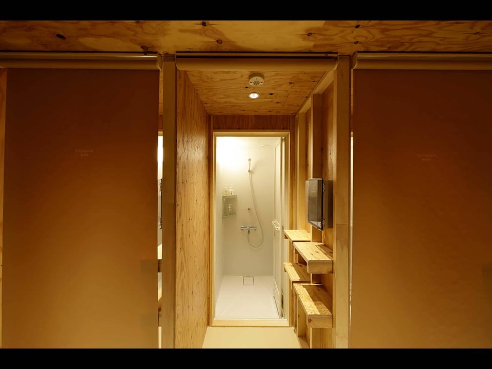 Shower, free toiletries, hair dryer, slippers