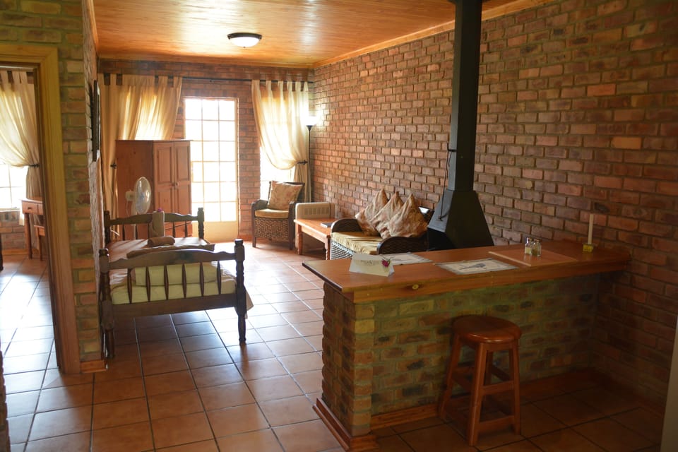 Bungalow (Twin) | Living area | TV, fireplace
