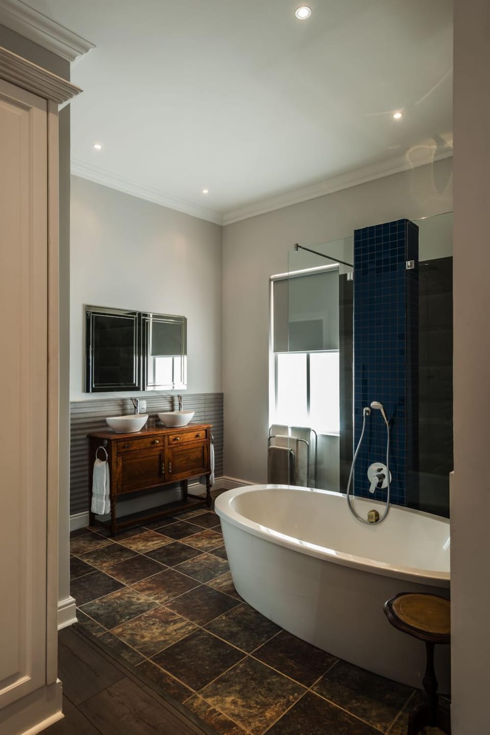 Waterstone Suite  | Bathroom | Shower, rainfall showerhead, hair dryer, bathrobes