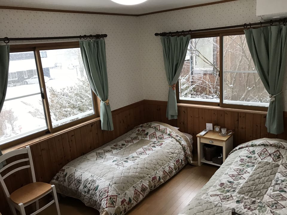 1 bedroom, desk, laptop workspace