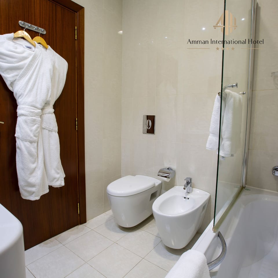Superior Single Room | Bathroom | Deep soaking tub, rainfall showerhead, free toiletries, hair dryer