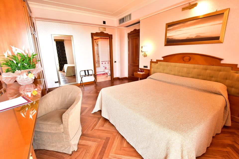 Select Comfort beds, minibar, in-room safe, desk