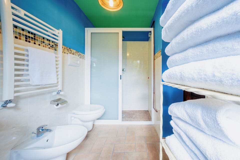 Family Room, 2 Bedrooms (5 people) | Bathroom | Shower, rainfall showerhead, hair dryer, bidet