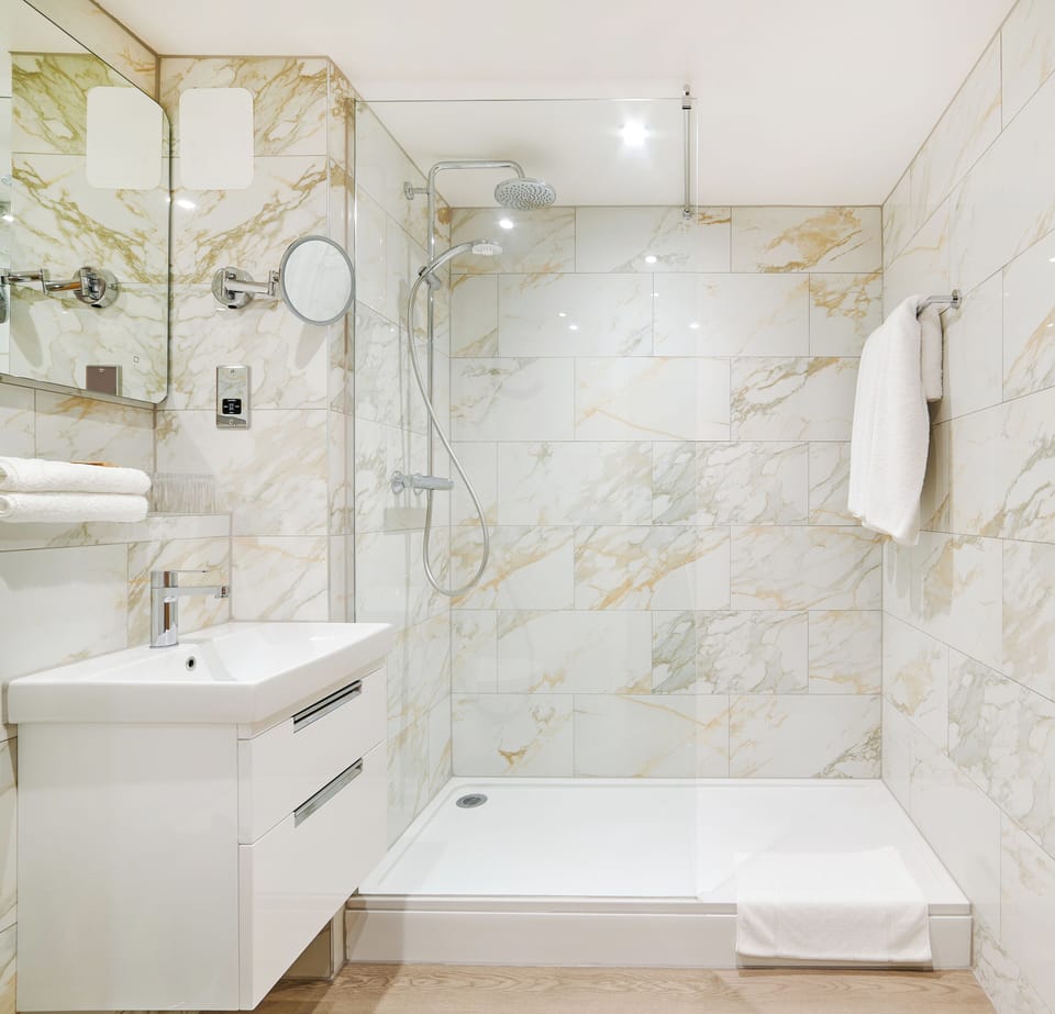 Shower, free toiletries, hair dryer, slippers