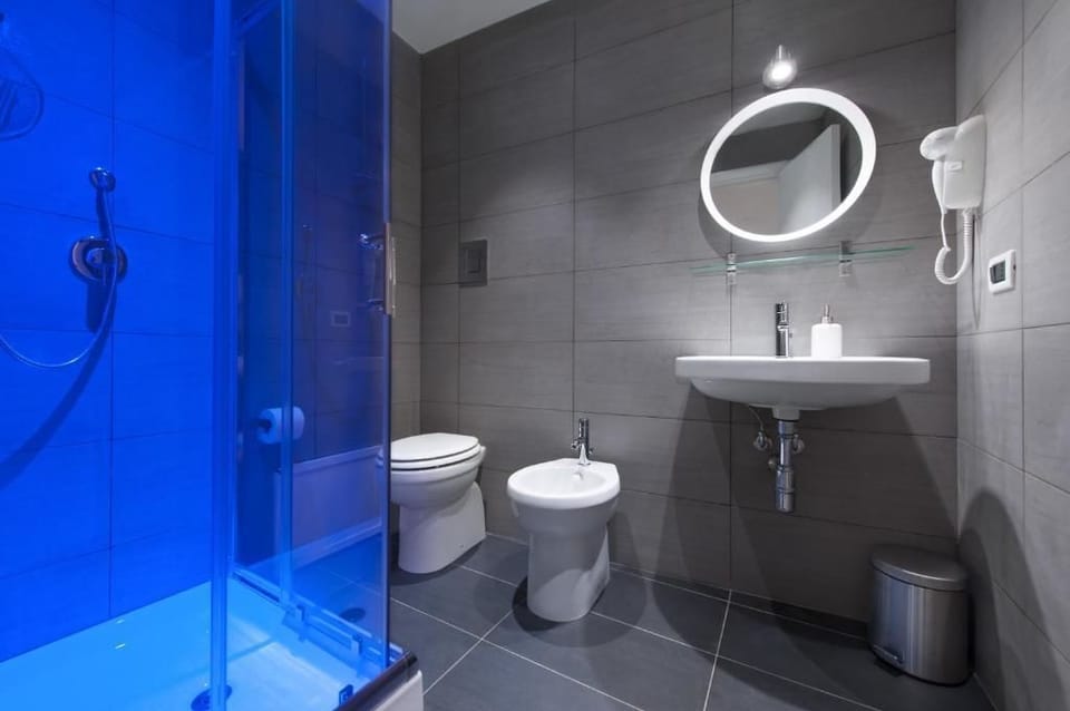 Basic Double Room (External Bathroom - Room 4) | Bathroom | Shower, free toiletries, hair dryer, bidet