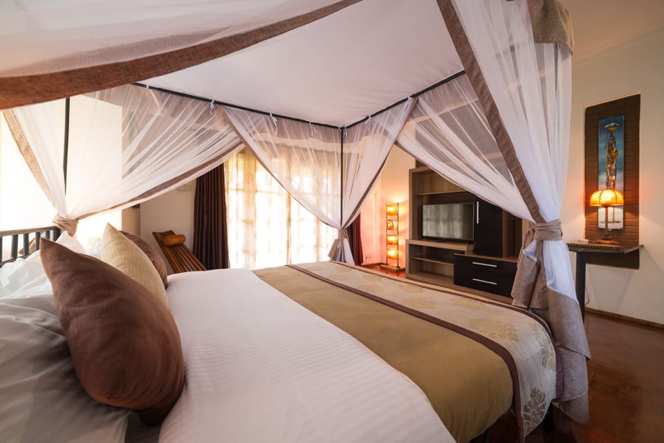 Junior Suite | In-room safe, iron/ironing board, free cribs/infant beds, free WiFi