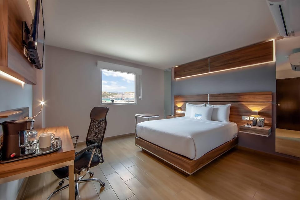 Premium bedding, in-room safe, desk, soundproofing