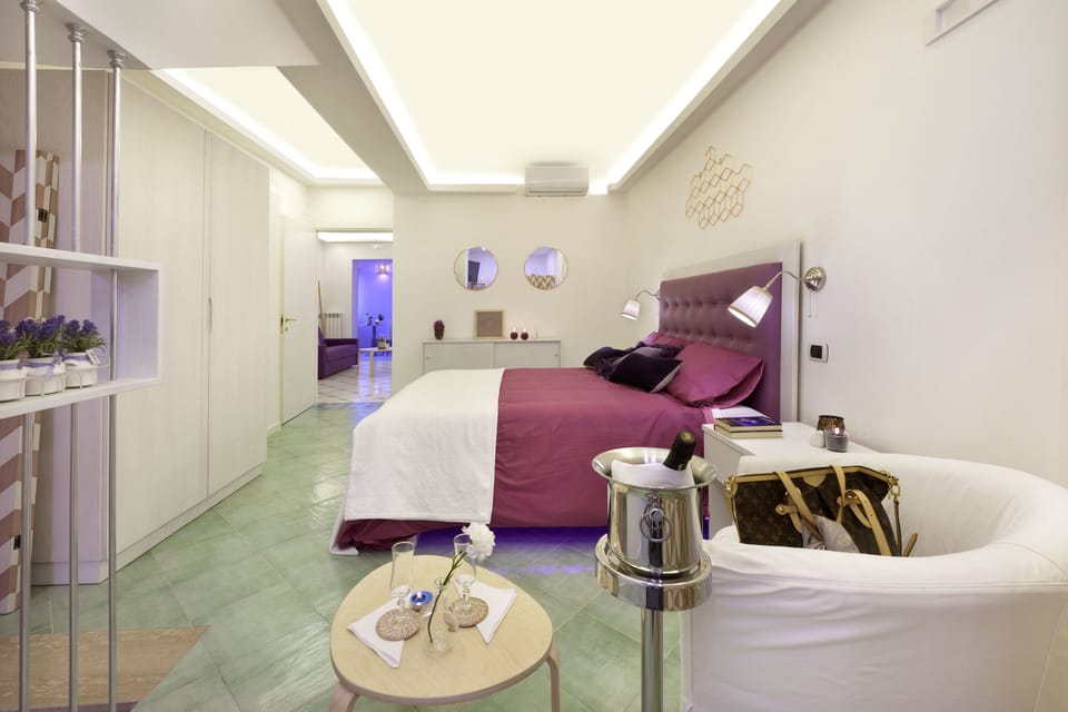 Suite, Jetted Tub | Premium bedding, minibar, in-room safe, individually decorated