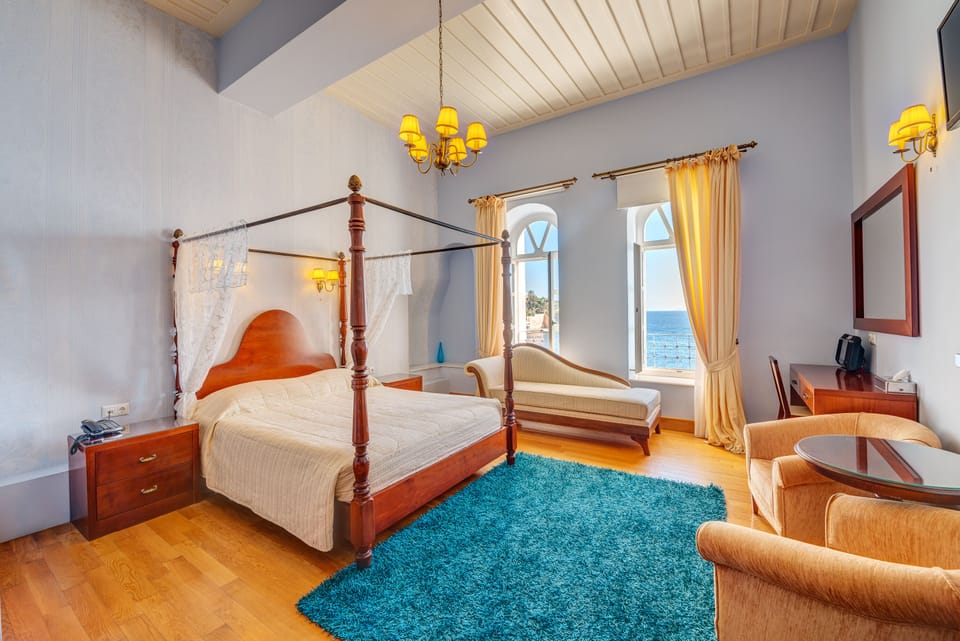 Honeymoon Suite, Sea View | Premium bedding, minibar, in-room safe, laptop workspace