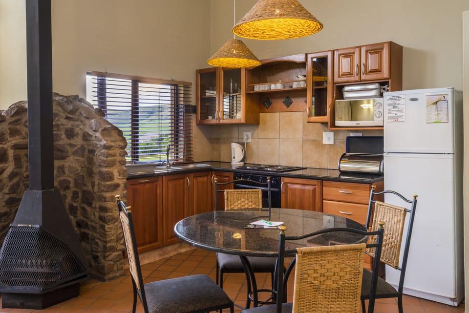 Deluxe Chalet | Private kitchenette | Full-size fridge, microwave, oven, stovetop