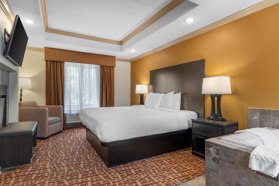 Suite, 1 King Bed, Non Smoking, Jetted Tub | Pillowtop beds, desk, laptop workspace, blackout drapes