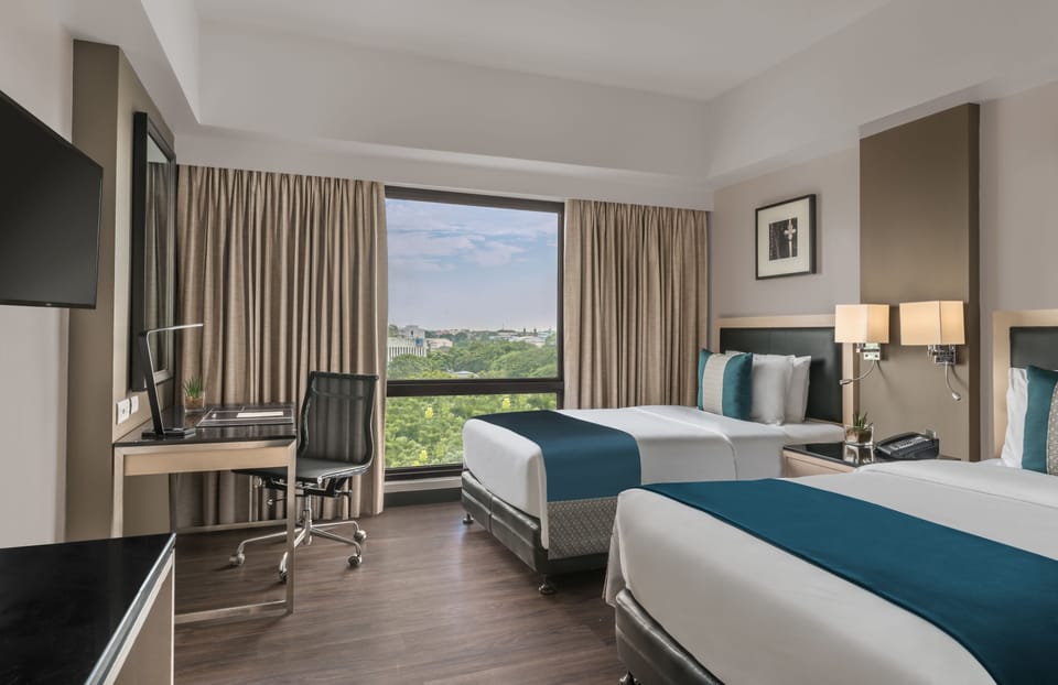 2 Single Beds, Standard Room | Minibar, in-room safe, desk, iron/ironing board