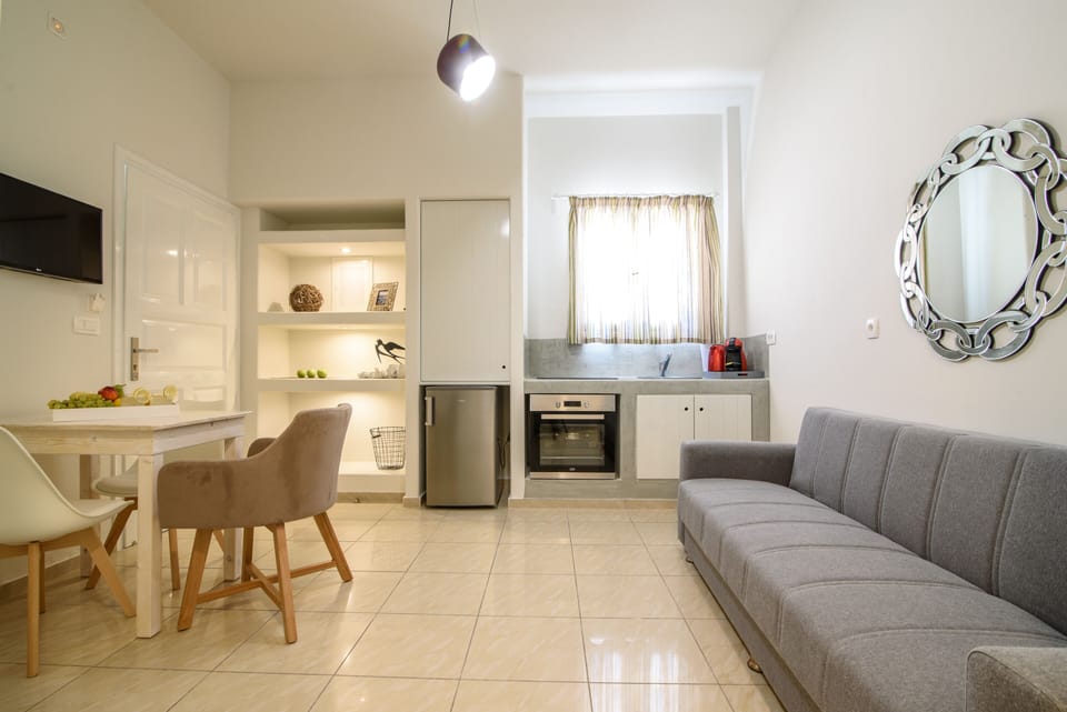 Superior Apartment, Hot Tub | Living room | 32-inch Smart TV with satellite channels, TV