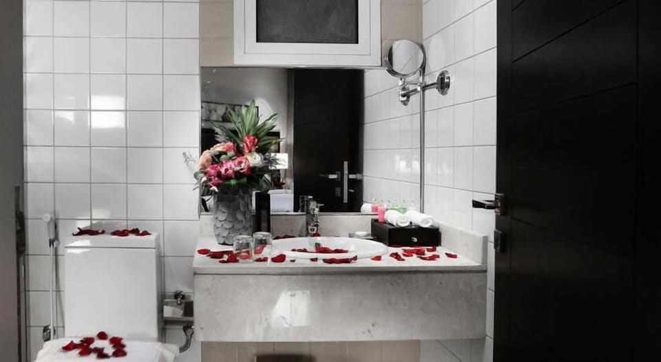 Shower, free toiletries, slippers, towels