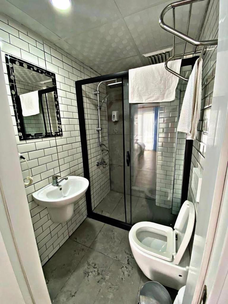 Family Quadruple Room | Bathroom | Shower, free toiletries, hair dryer, towels
