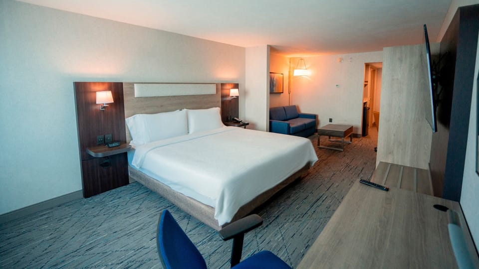 Suite, 1 Bedroom | Desk, iron/ironing board, free WiFi, bed sheets