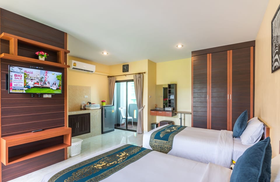 Twin Room | Individually decorated, blackout drapes, free WiFi, bed sheets