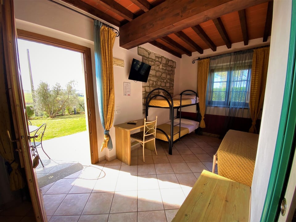 Superior Quadruple Room, 1 Bedroom, Pool View, Garden Area | Living area | Flat-screen TV