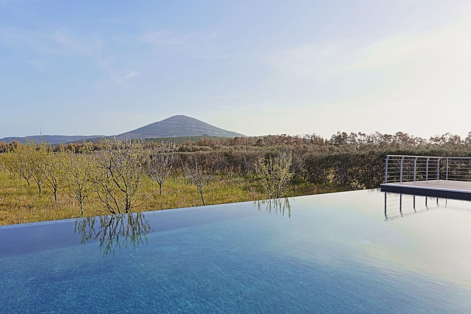 Indoor pool, outdoor pool, pool umbrellas, sun loungers