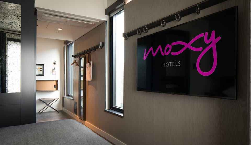 Desk, blackout drapes, iron/ironing board, free cribs/infant beds