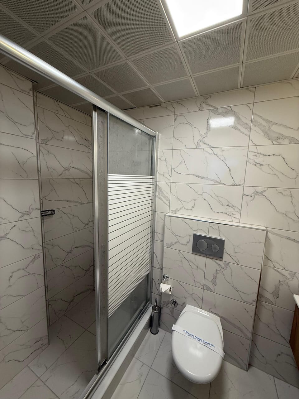 Family Triple Room | Bathroom | Shower, free toiletries, hair dryer, slippers