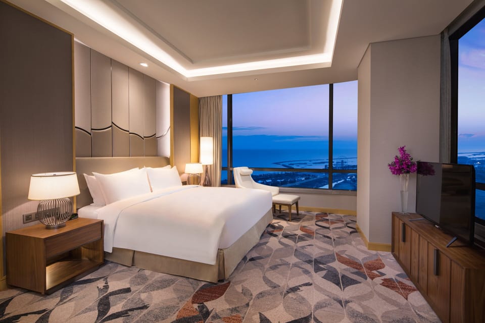 Premium Room, 1 King Bed, Lake View | In-room safe, desk, laptop workspace, blackout drapes