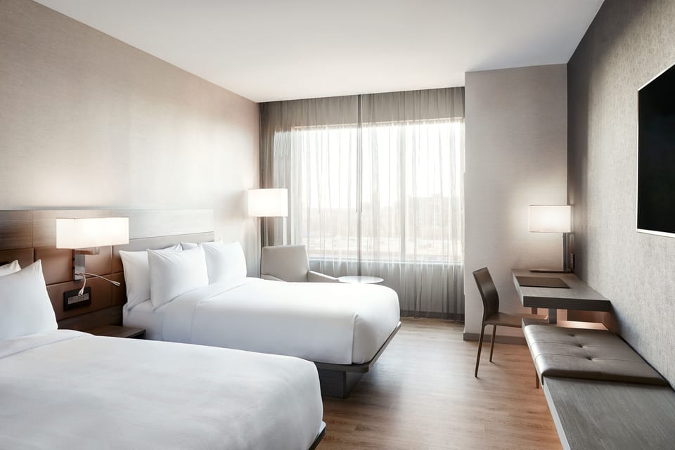 Premium bedding, pillowtop beds, in-room safe, desk