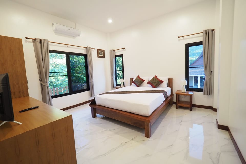 Family Room, 2 Bedrooms, Balcony, Garden View | Premium bedding, minibar, individually decorated, individually furnished