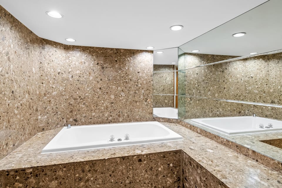 Suite, 1 King Bed, Non Smoking (2 Rooms) | Bathroom | Combined shower/tub, free toiletries, hair dryer, towels