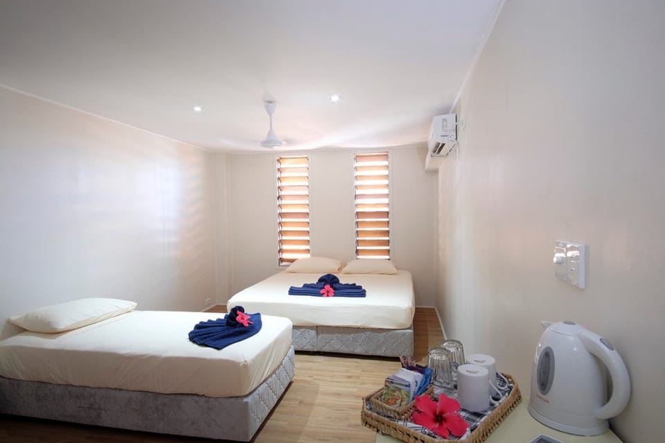 Triple Room | Premium bedding, in-room safe, iron/ironing board, bed sheets