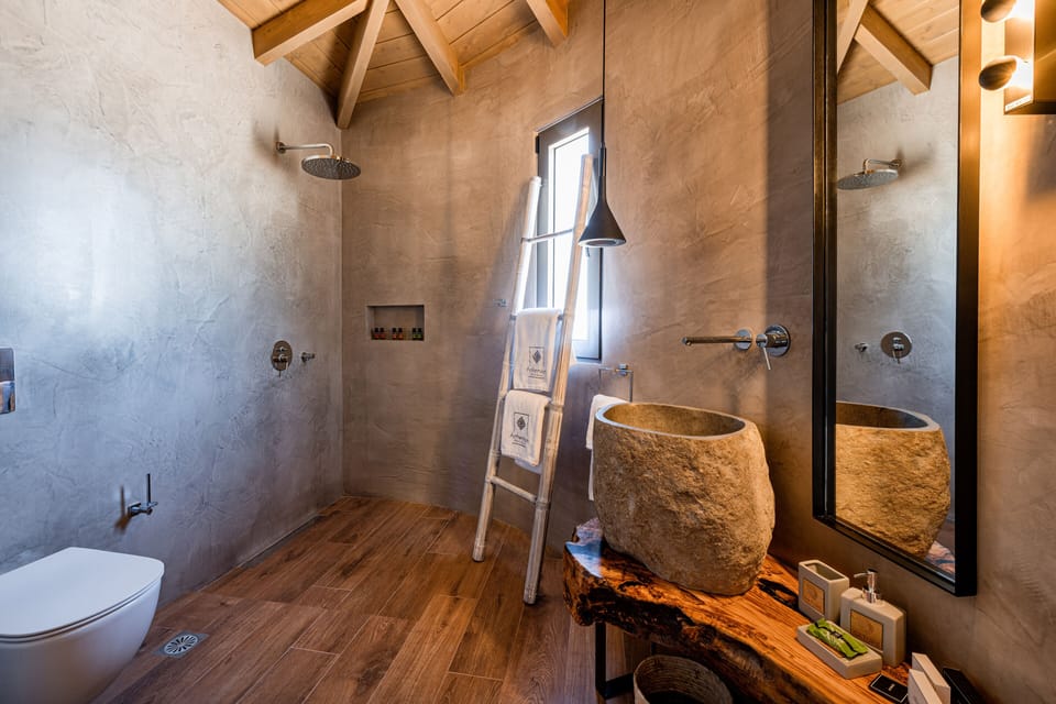 Premium Suite, 1 Bedroom | Bathroom | Shower, free toiletries, hair dryer, slippers