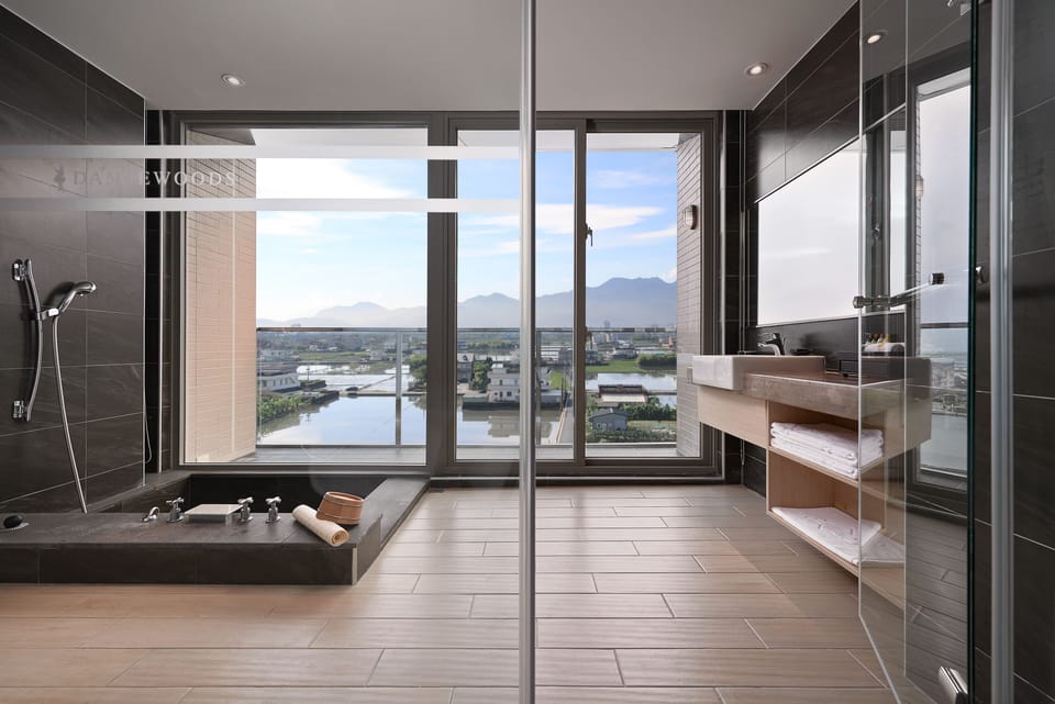 Combined shower/tub, deep soaking tub, hair dryer, bathrobes