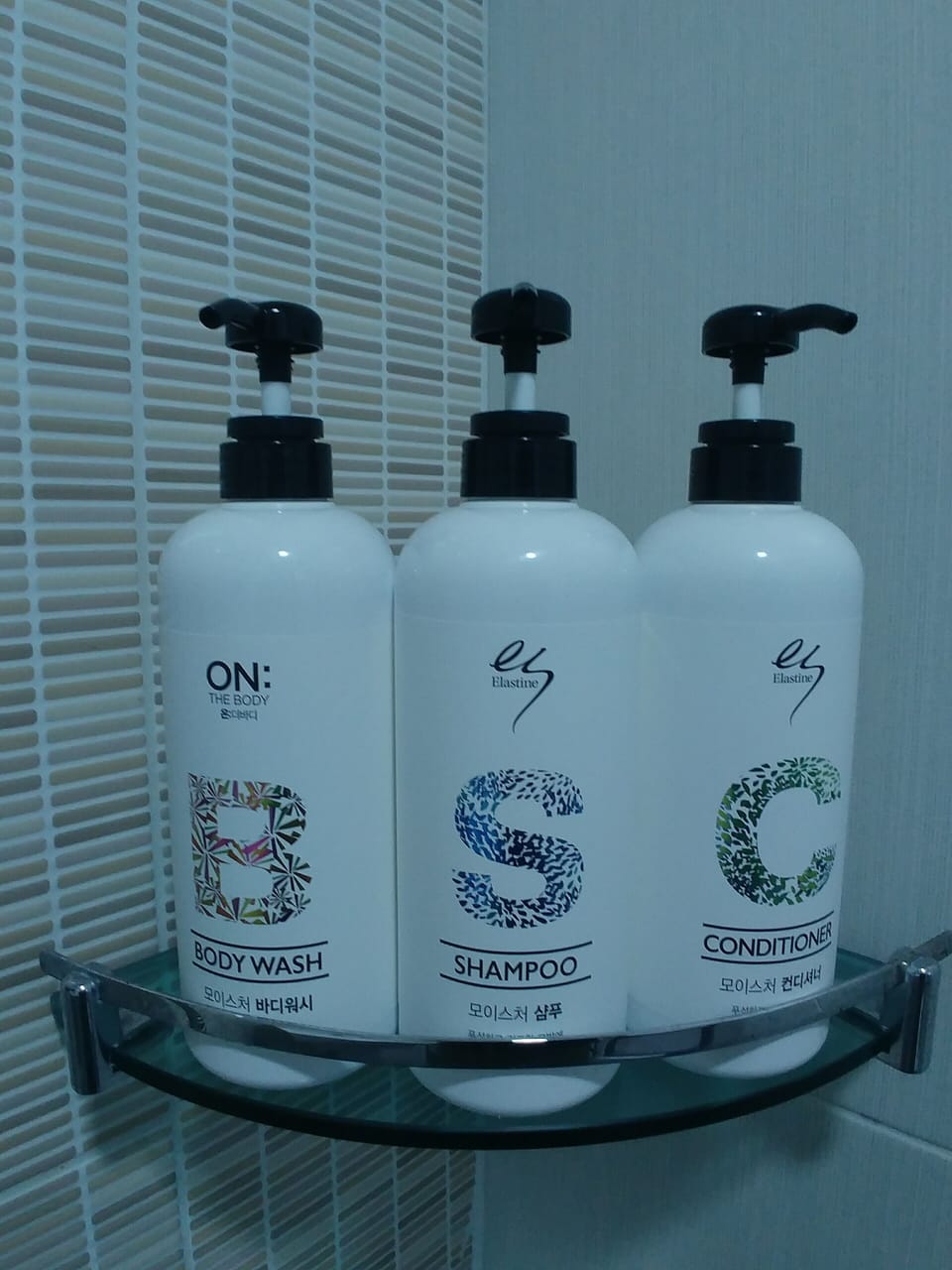 Shower, hair dryer, slippers, towels