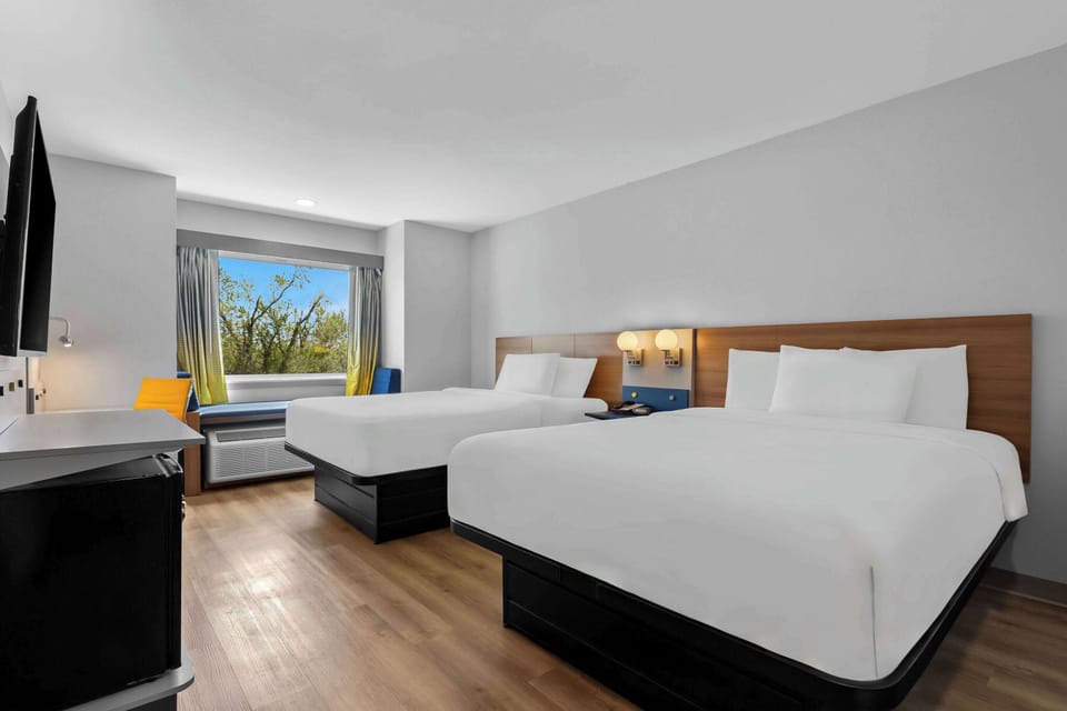 Room, 2 Queen Beds, Non Smoking | Premium bedding, laptop workspace, blackout drapes, iron/ironing board