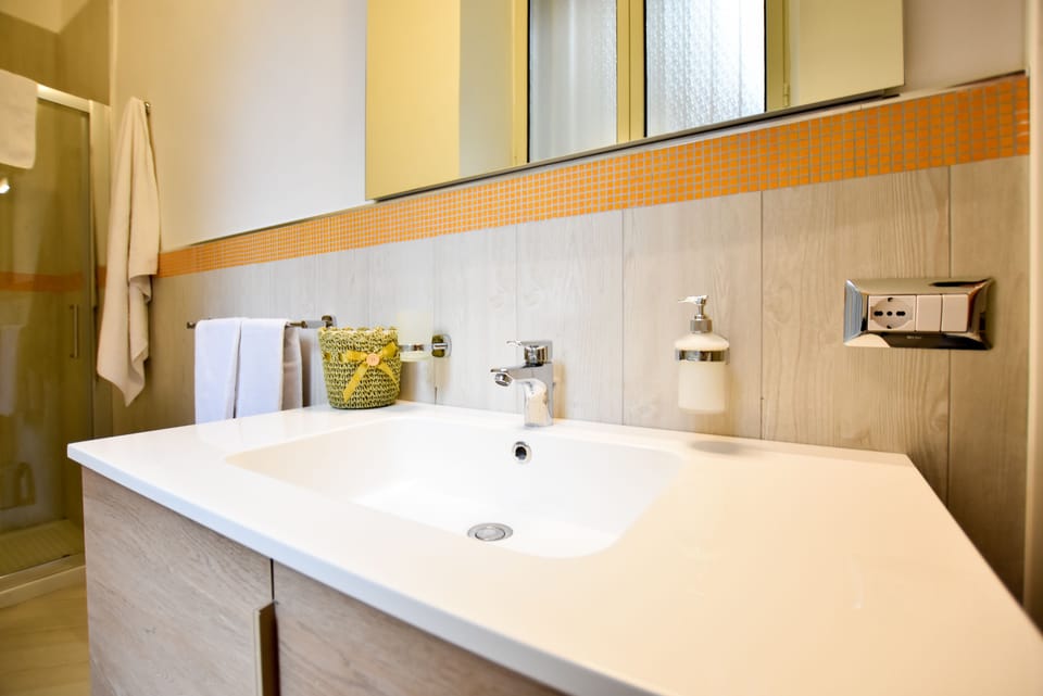 Comfort Quadruple Room, Balcony | Bathroom | Shower, rainfall showerhead, free toiletries, hair dryer