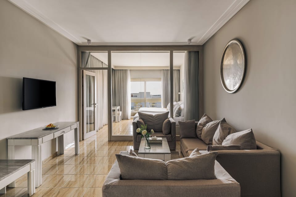 Deluxe Suite (Family) | Living area | Flat-screen TV, table tennis