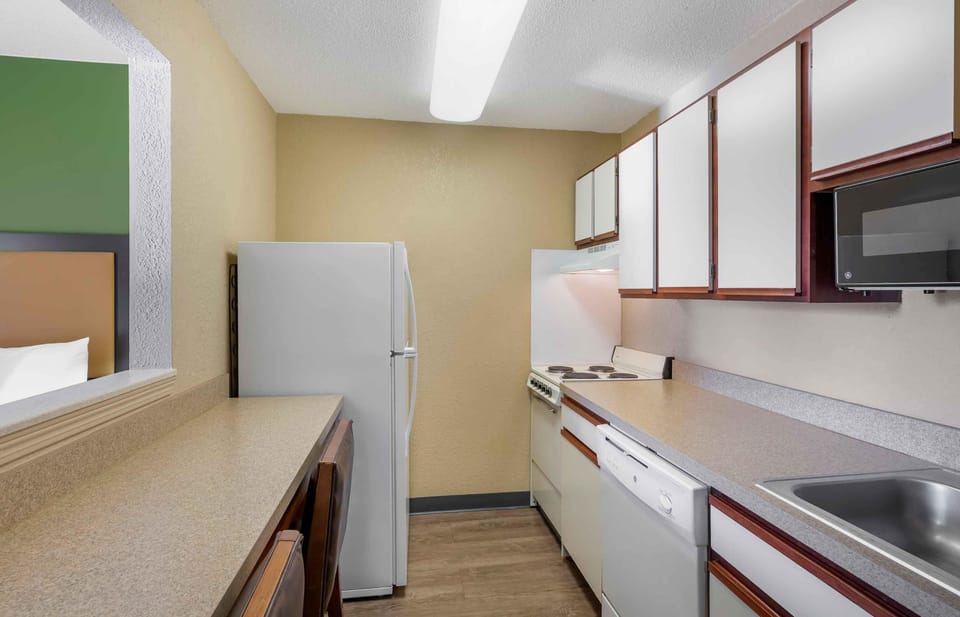 Studio, 2 Queen Beds, Non Smoking | Private kitchen | Full-size fridge, microwave, oven, dishwasher