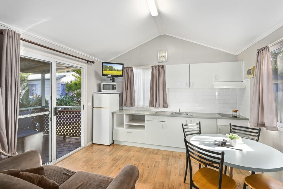 Family Cabin, 1 Bedroom (C4) | Private kitchen | Fridge, stovetop, electric kettle, cookware/dishes/utensils
