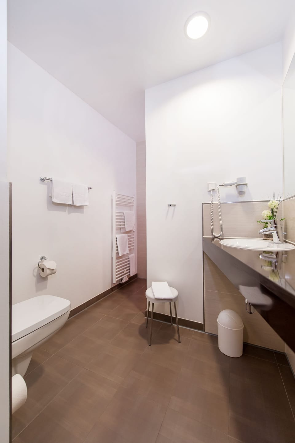 Shower, free toiletries, hair dryer, slippers