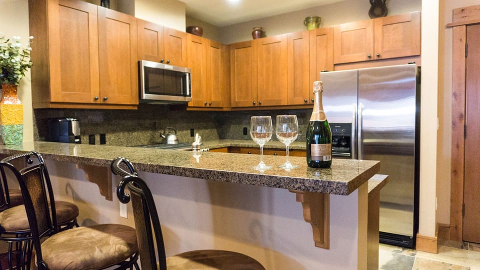 Condo, 1 Bedroom | Private kitchen | Full-size fridge, microwave, oven, stovetop