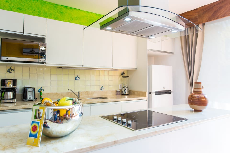 Two Bedroom Master Suite with Balcony, Kitchenette and Pool View | Private kitchen | Cookware/dishes/utensils