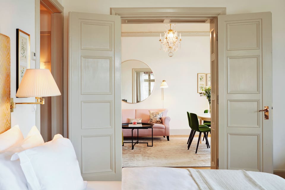 Executive Sea View Suite | Living area | Flat-screen TV, pay movies