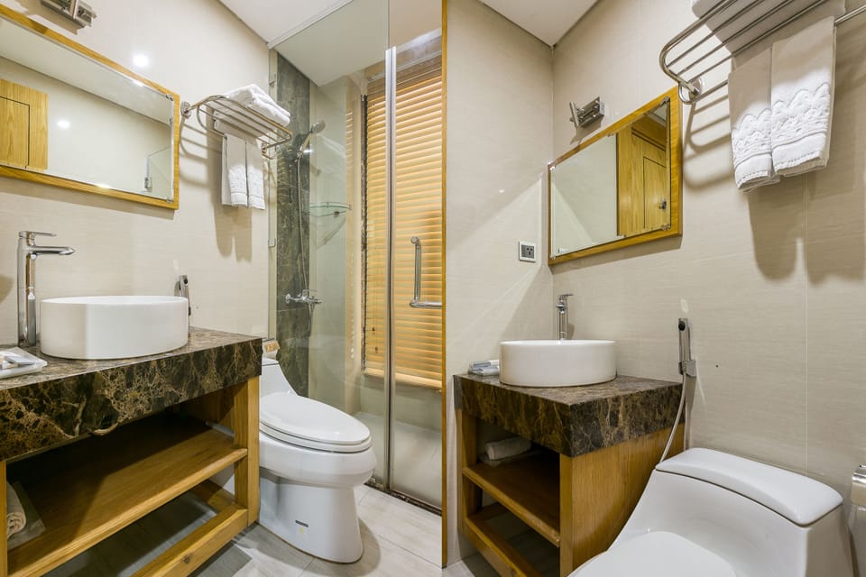 Shower, rainfall showerhead, designer toiletries, hair dryer